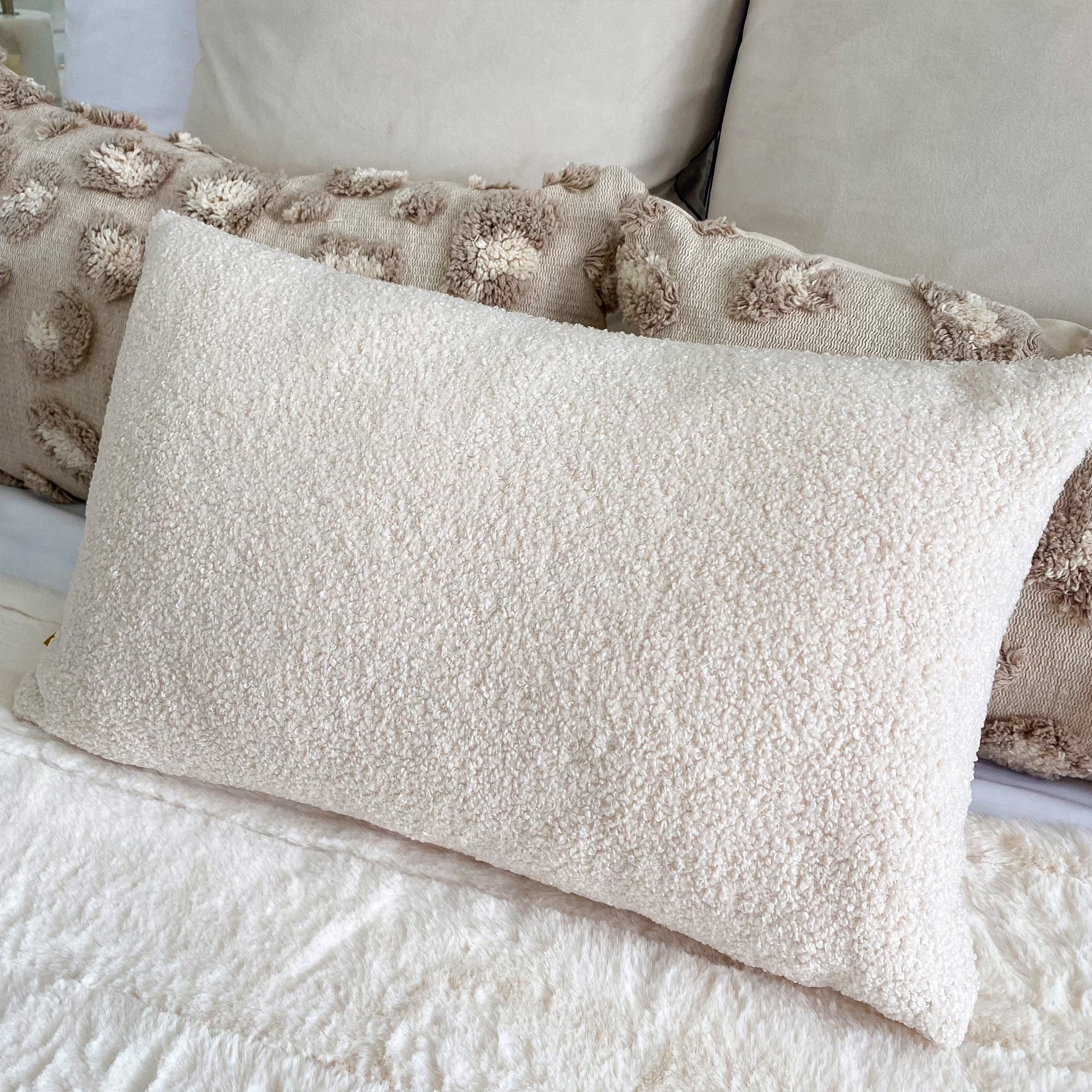 Coussin Sherpa crème