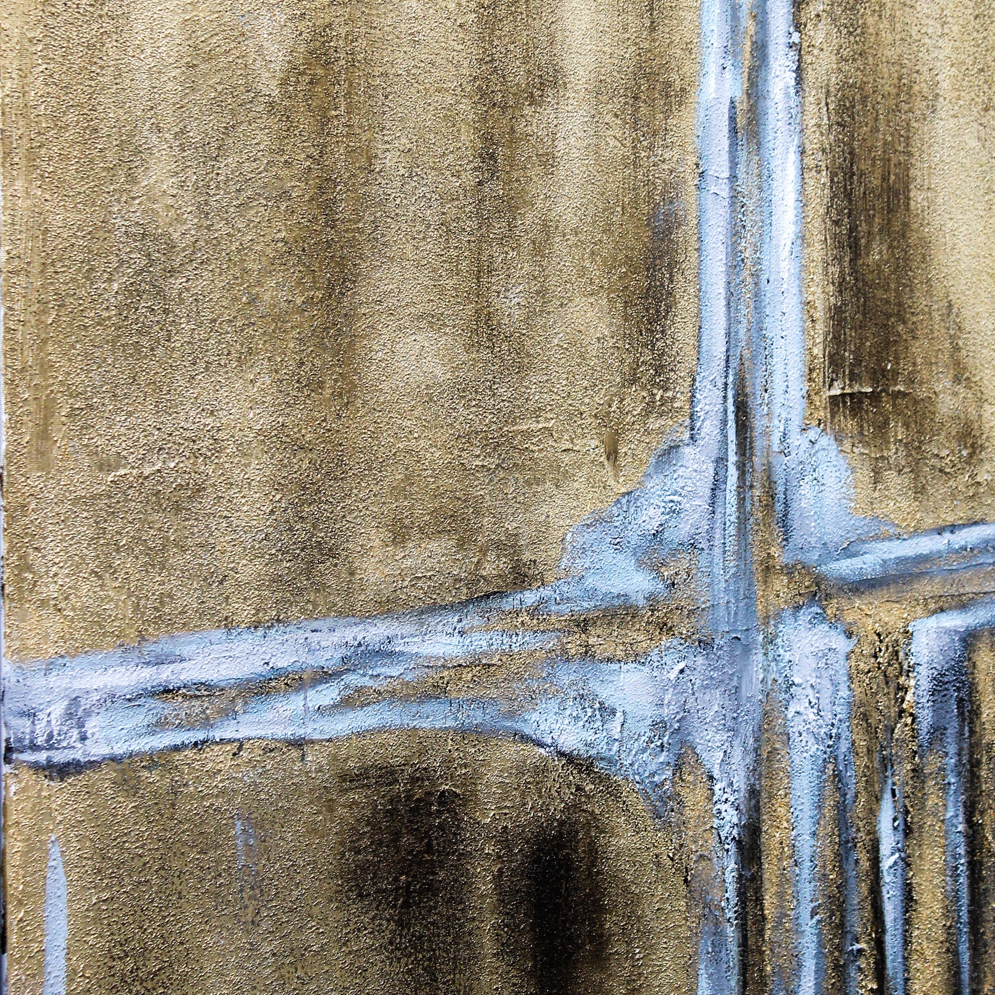 Toile dorée encadrée avec un contraste gris froid dans un cadre noir