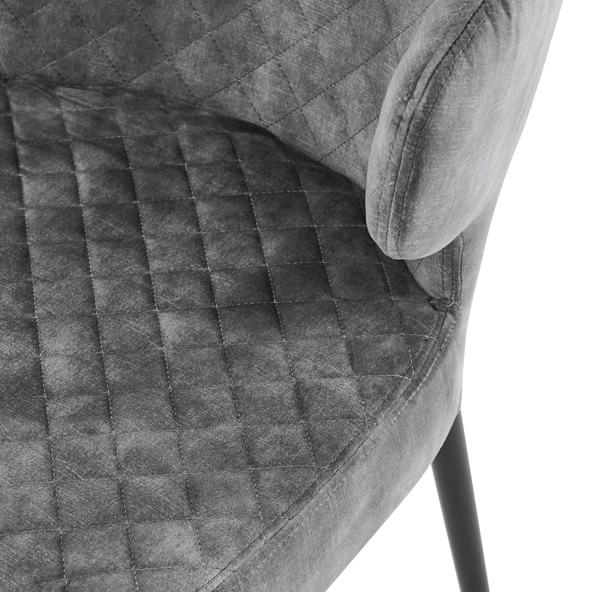 Chaise de salle à manger Levi en velours gris avec pieds noirs matelassés