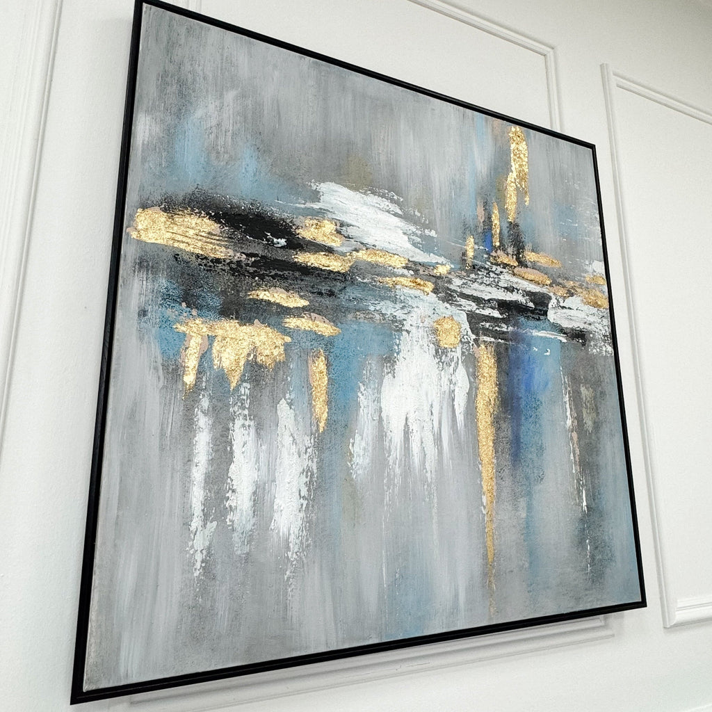 Toile abstraite encadrée noire aux tons dorés et bleus