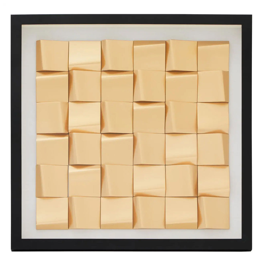Décoration murale en forme de cube doré dans un cadre en forme de boîte