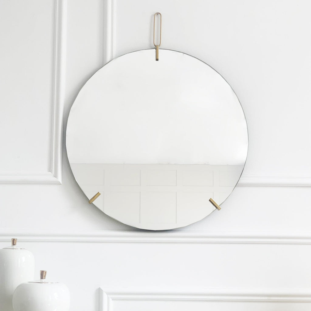 Miroir rond doré minimaliste